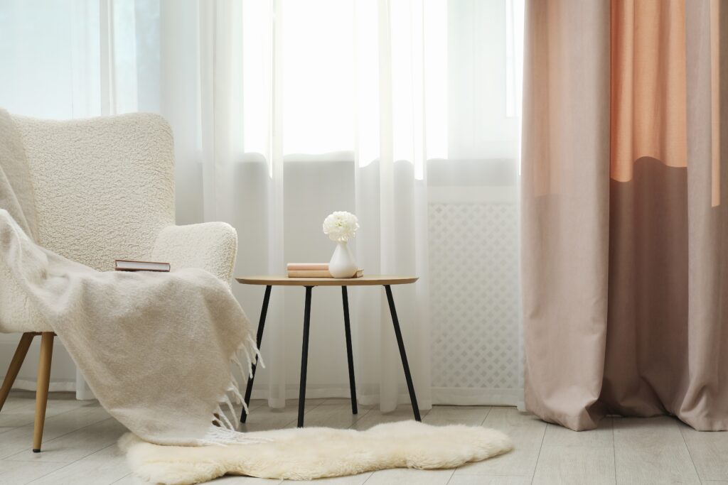 Modern Australian living room featuring sustainable curtain options, custom curtains from Melbourne, and premium curtain fabrics in neutral tones.