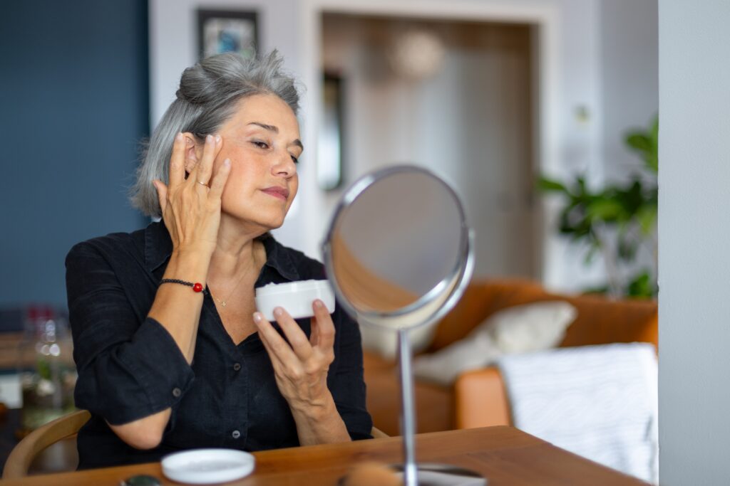 Woman representing different life stages using active skincare by age, an anti ageing serum, and a vitamin C serum in Australia as part of an age-appropriate skincare routine.