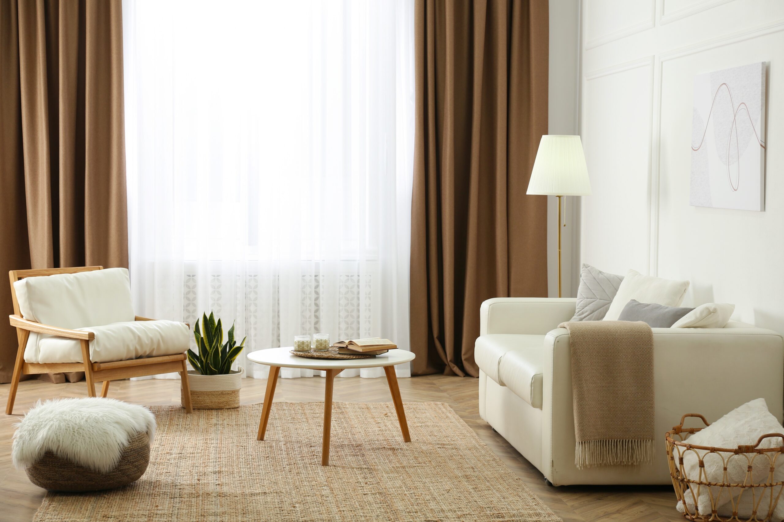 Modern Australian home featuring sheer curtains, blockout linen curtains, and stylish window treatments in a bright living room.